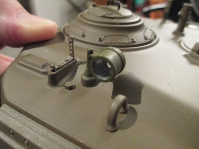 Drilled out the housing and a wiring access hole in the turret roof with a small carbide bit