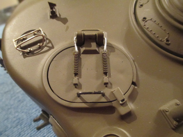 Hours later, I am finally satisfied with the scale appearance of the Loader's Hatch spring connection to the hinges