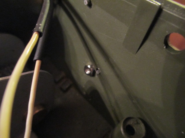 A nut holds everything in place on the inside hull