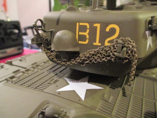 Chain and a metal helmet on the turret back