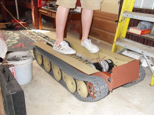 Strong,yes.weight distributed evenly across the torsion rods. John weighs about 170.lbs the hull is designed to support 330 pounds before spring tension is negative.Meaning the springs even at fully loaded designed weight still retain full rotation of 22 degs. Fully loaded with lead acid battery's the Jagdpanther still weighs less than 150.lbs.