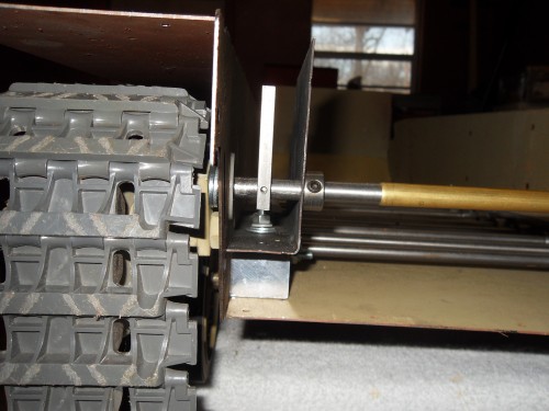 Tension lever,support bracket and shaft. The twin rail suspension system mounting bolts also retain the tension bracket.Simple yet effective solutions.