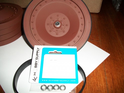 Bearings added to 1/6th scale Jagdpanther wheels to decrease friction and Rubber liners to increase track cohesion.