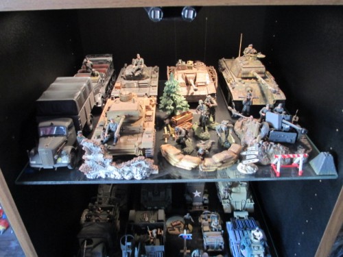 Top shelf some lights lit Light and Medium German Armor and Recon.