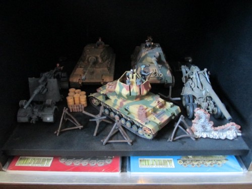 Fourth shelf is Heavy Artillery and German Flak and Heavy Tiger ll and Jagdtiger