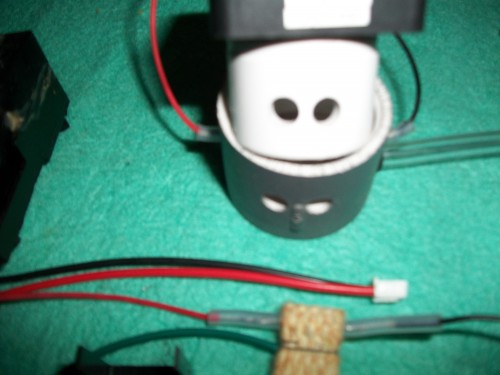 The ports,aligned to keep the unit in position by inserting the tubing.Surgical tubing works best.