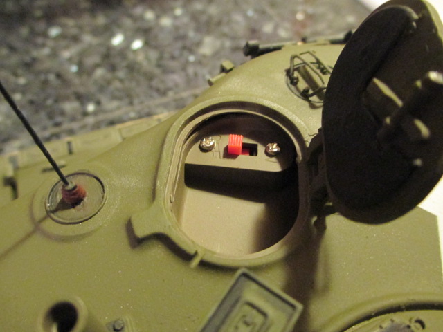 New switch mounted in the repaired tray with Tamiya nuts and bolts