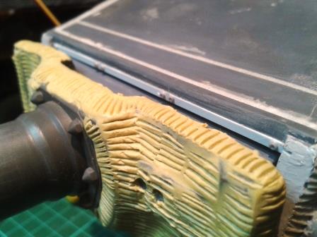 The correction to the front lip of the turret roof with new edging strip and bolts.jpg