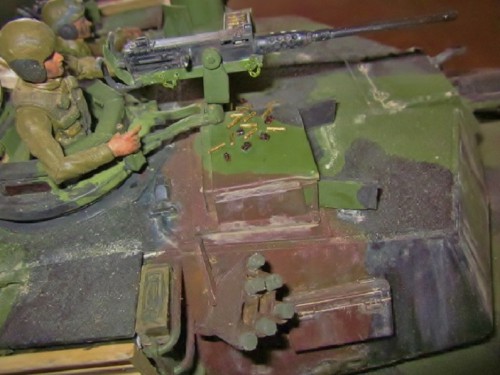 some spent 50 cal brass and cartridge links to make it loo like the 50 was fired. And gun mounting pins and chains
