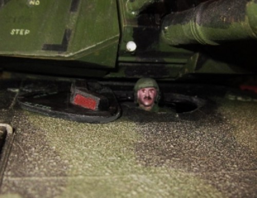 when you get the figure in the correct position he just clears the bottom of the turret when rotated
