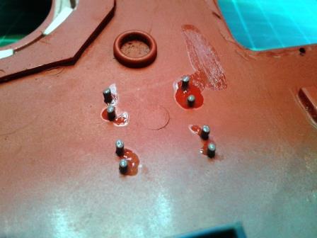 Not my neatest work - but this is how the plastic rod bolts are held in place beneath the turret roof.jpg