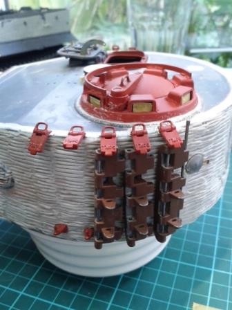 Spare track links in place on the port side of the turret.jpg
