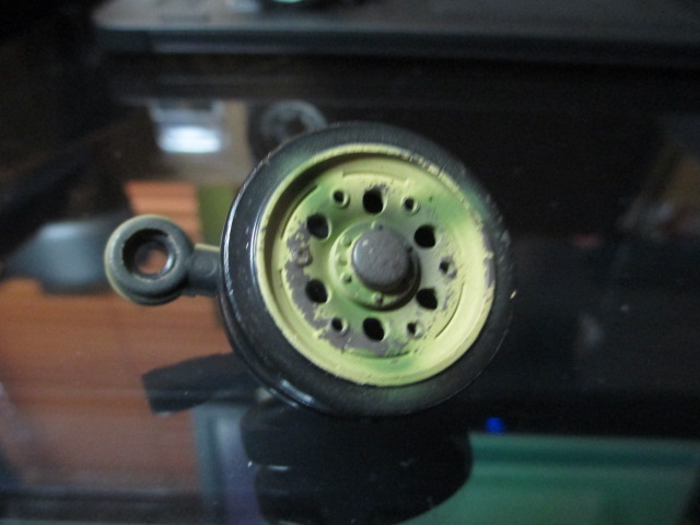 Begin with the old plastic wheel