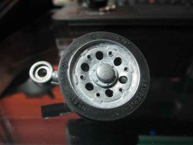 New metal wheel and arm assembly for plastic lower hull