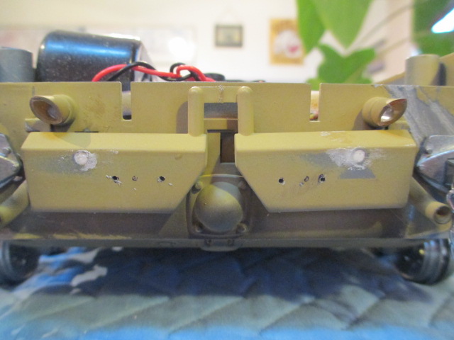Bolt holes added to the mufflers.  Eventually, the later StuG models got an exhaust redirector in this location on the vehicle.
