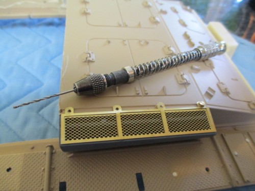 Using my Yankee Drill, holes are prepared for the bolts that add to the appearance and mounting of the PE brass screens and grills.