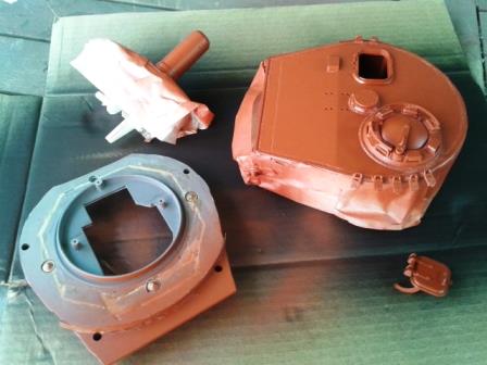To make myself feel I was making some progress I gave the turret a coat of red primer - carefully masking the zimmerit.jpg
