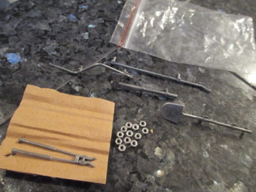 A nice set of metal tools to replace the sliced off molded plastic ones.
