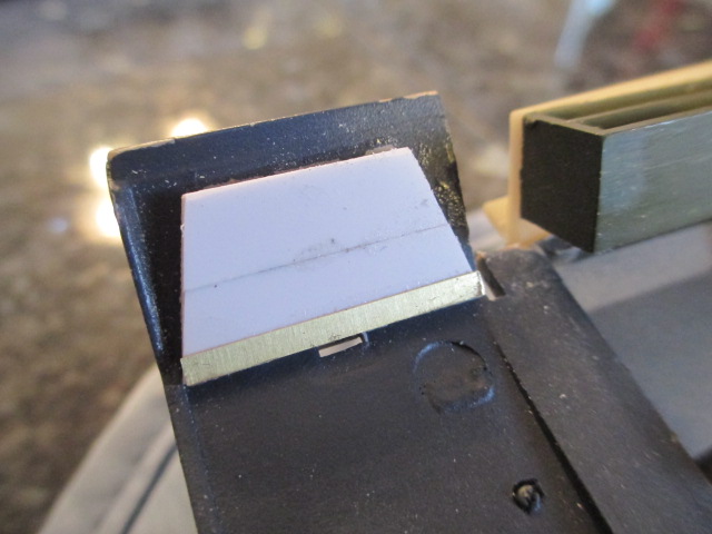 Brass strip for a hinge plate