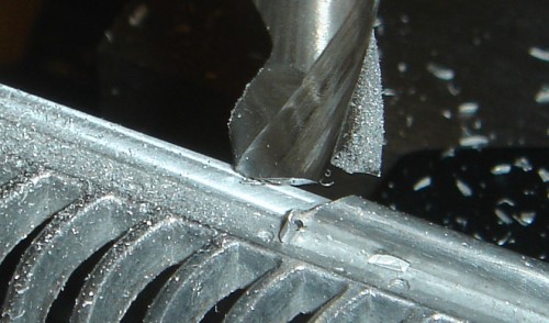 16 mm end mill in action, the metal is relatively soft and machines very easily.