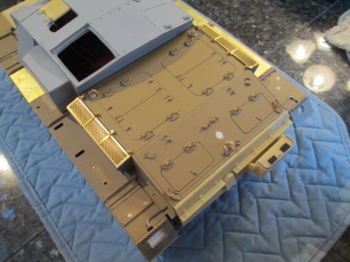 Mounted back on the lower hull