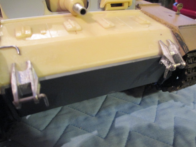Located and mounted the front tow shackles.  They also make a nice fastener for the front of the deck.