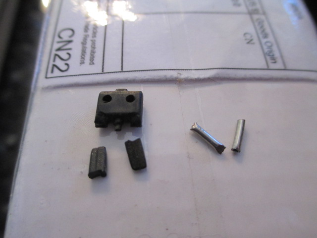 A couple of pieces of solder, and a chopped up Pershing tank center link along with two small brass squares...