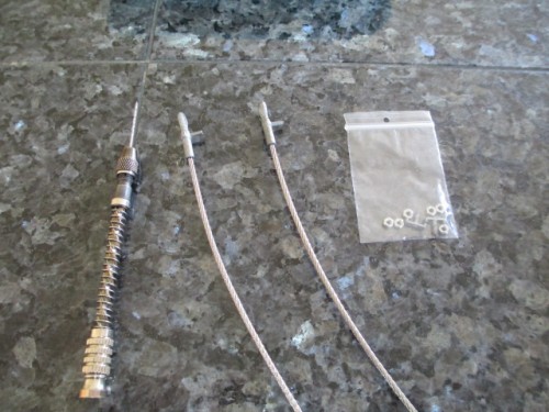 What you start with, a couple of bridge cables and some seemingly flimsy mounting hardware.