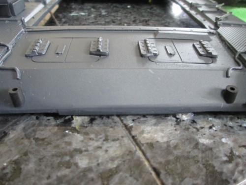 The exteriors of the Pz III headlights were too large to fit into the armored covers used by this early StuG.  I drilled access holes for wiring and mounted rubber stems.