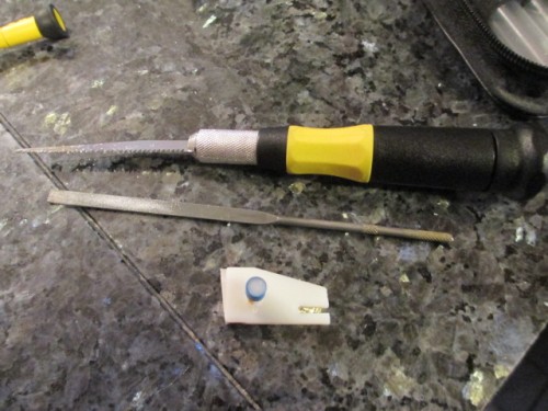 One trunnion side removed and shortened