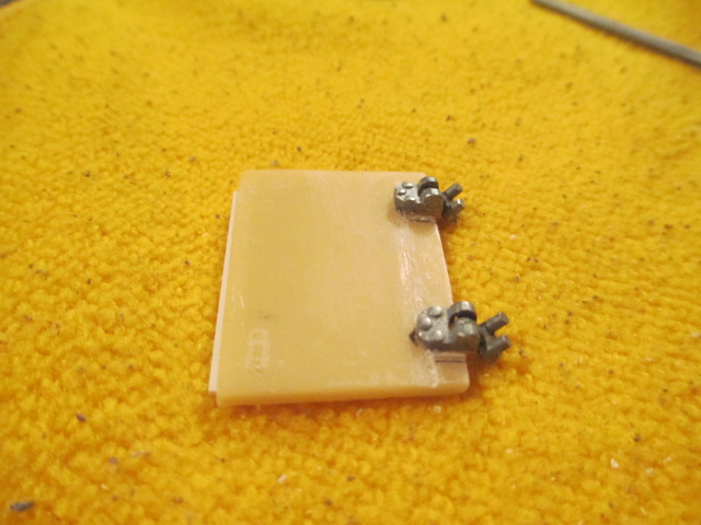 Holes drilled and hinges mounted on one panel