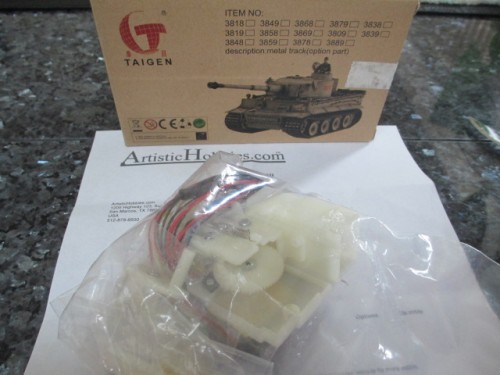 A flash unit along with some unexpected goodies.  A new recoil unit and trunnion mounts!