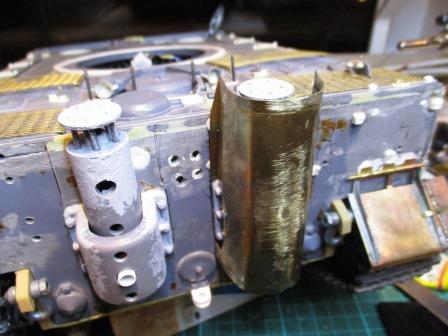 Still a bit of a mess - but we're getting there. Voyager photo-etch exhaust shroud temporarily in place.jpg