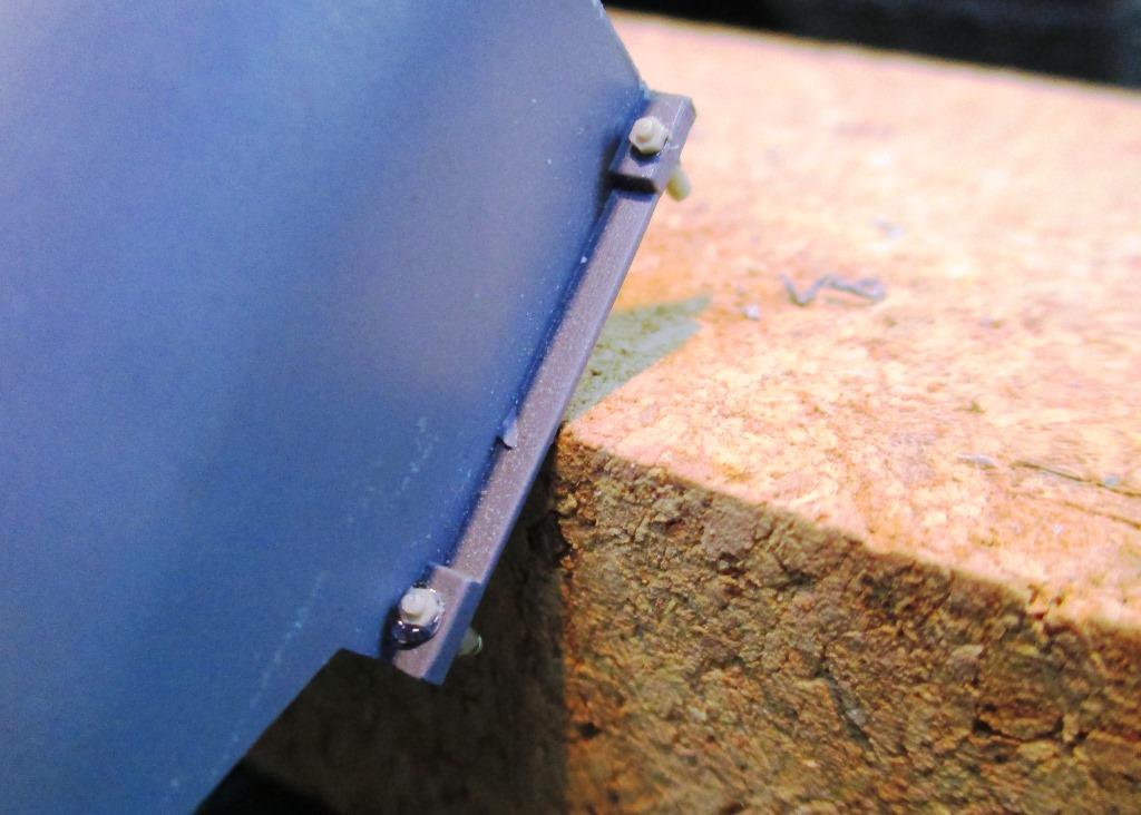 Close-up of the Masterclub hex-head bolts on the exhaust shield.jpg