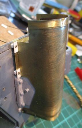 Here the shield is temporarily held in place using dress-making pins.jpg