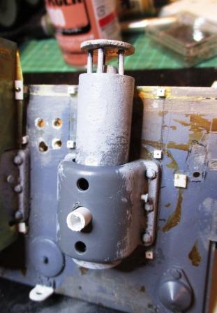 A piece of plastic tube is used to keep the exhausts in place now that the HL plastic shields have been done away with.jpg