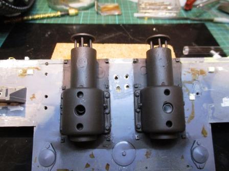 The darker shade used to prime the exhausts and the part of the rear plate within the outer shields.jpg