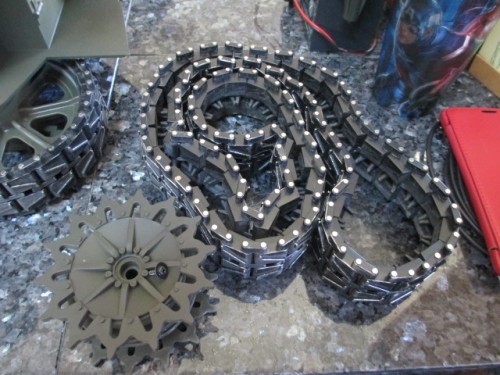 Mike's tracks for his tractor build and the original sprocket which is held on by a small screw