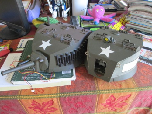 Mikes turret next to the stock one.  Molded on grousers have been removed, again days of work saved.  Thanks, Mike!!