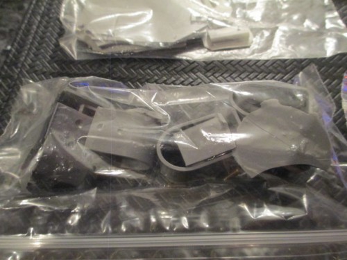 Skid rails and molded bolt closures.