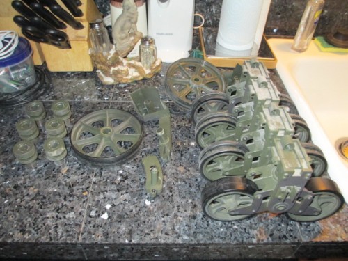 Complete lot of running gear including one with the right road wheels mounted.