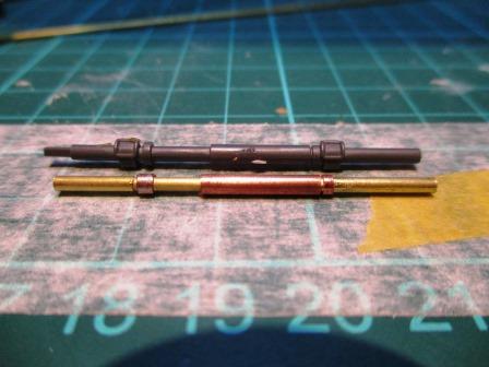 The crack shaft showing the Tamiya original and the replacement made from various lengths of telescopic brass tubing.jpg