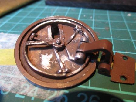 Here is the driver's hatch after a second attempt to fill the holes with terracotta Milliput.jpg