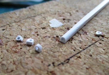 Fender mounting points were cut sausage-like from a length of square plastic tube drilled and sanded to shape.jpg