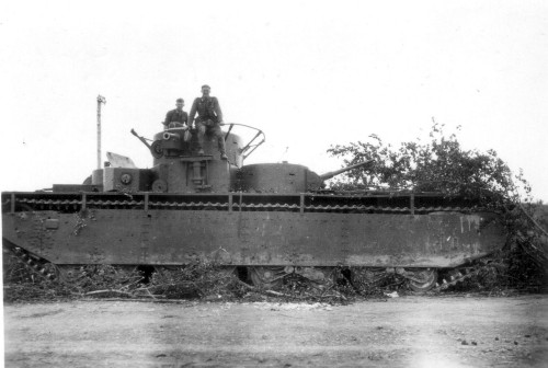 Bemused Germans with captured T-35. Looks more like a stranded u-boat