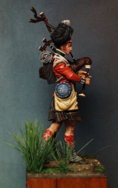 Highland piper, with a canteen full of whiskey..probably..