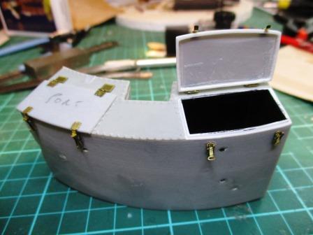 Hinges and clamps now in place and a dark coat of paint added to the interior.jpg