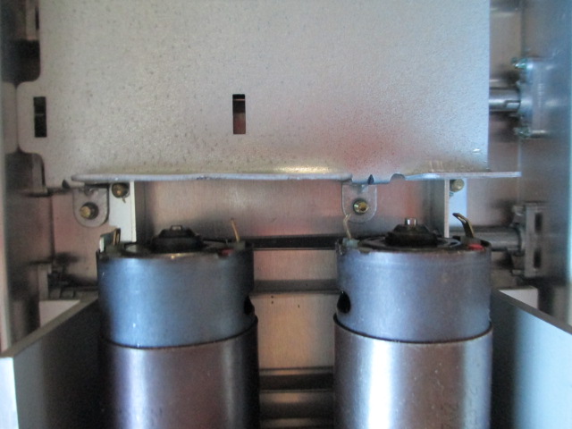 The edge now provides room plus a protected attachment area for the motors.