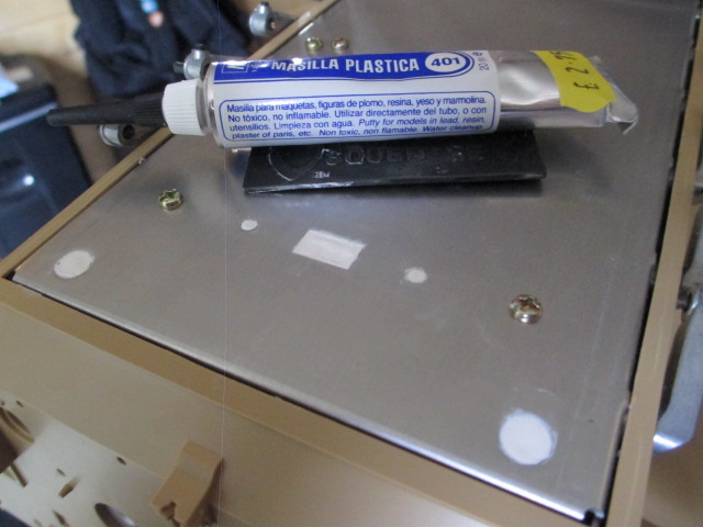 Sealed and smoothed with one of those mini squeegees you get with the phone display protector kits...
