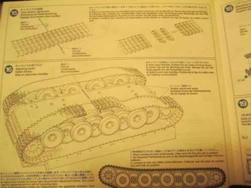 Steps 14 and 15...Tamiya wants you to remove two track links to mount these.  Only one track link is required to get almost perfect slack right off of the bat.